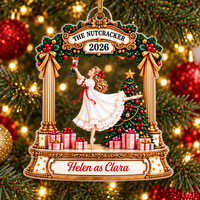 Custom Nutcracker ornament showing Clara in a white dress holding a toy soldier, tree, and 'Helen as Clara' text.