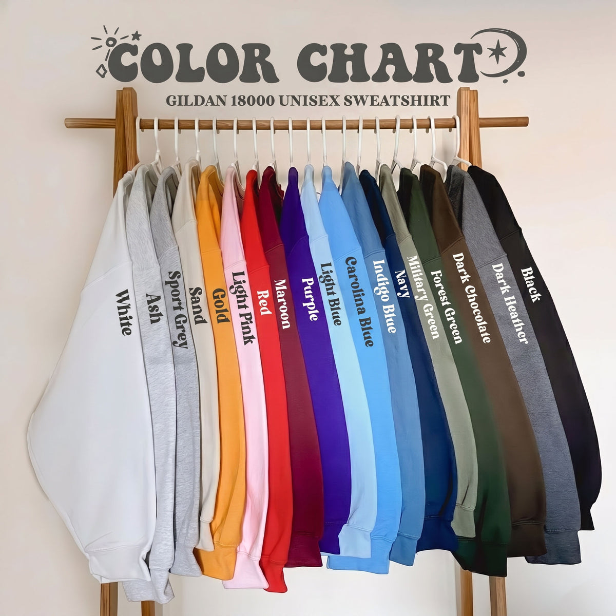 A wooden clothing rack displaying an array of sweatshirts in various colors with printed text labels.