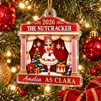 A glossy red 2026 The Nutcracker Personalized Acrylic Christmas Ornament featuring Clara on a theater stage, hanging on a
