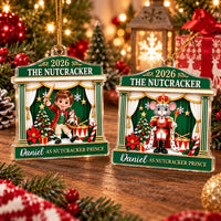 Two 2026 The Nutcracker Personalized Acrylic Christmas Ornaments in green hanging on a tree, showing a toy soldier and a