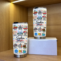 Two custom name drinkware tumblers displayed on wooden shelves in a retail setting.