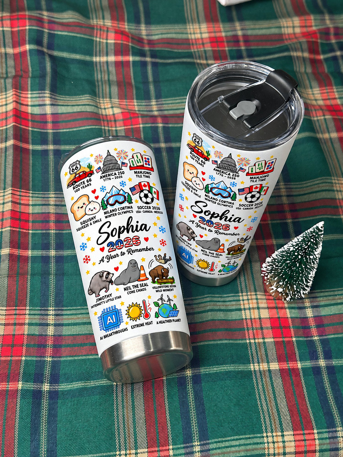 Two A Year to Remember Tumblers placed on a red and green plaid fabric backdrop.