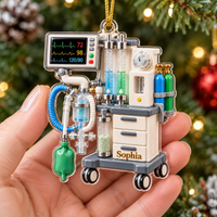 Anesthesia Machine Ornament Personalized Acrylic held in a hand before Christmas tree