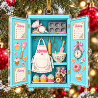 Hanging baking ornament featured against a glowing Christmas tree with warm lights and festive ornaments.