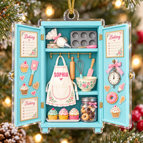 Detailed front view of the personalized turquoise kitchen cabinet ornament hanging on a festive tree branch.