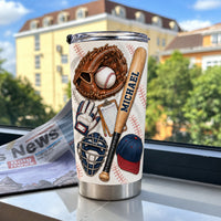Personalized baseball tumbler next to newspaper on windowsill with urban view