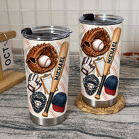 Two stainless steel baseball cups with custom names on white grid backdrop