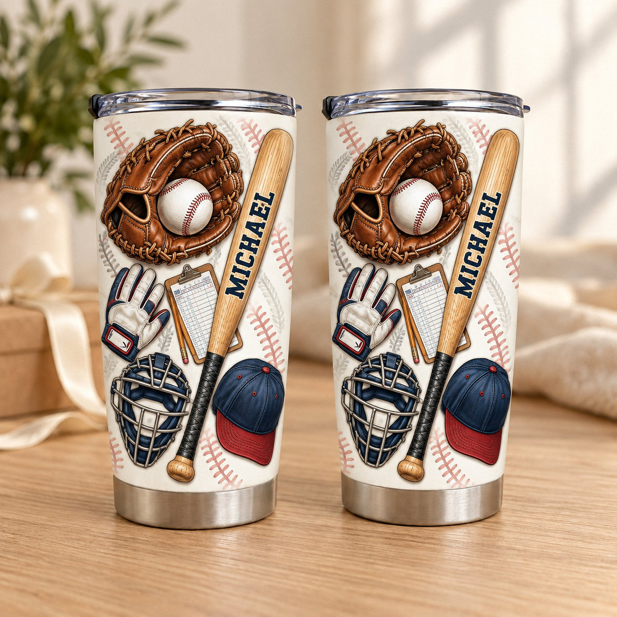 Two stainless steel tumblers featuring a baseball equipment collage and the custom name Michael printed on the bat handle.