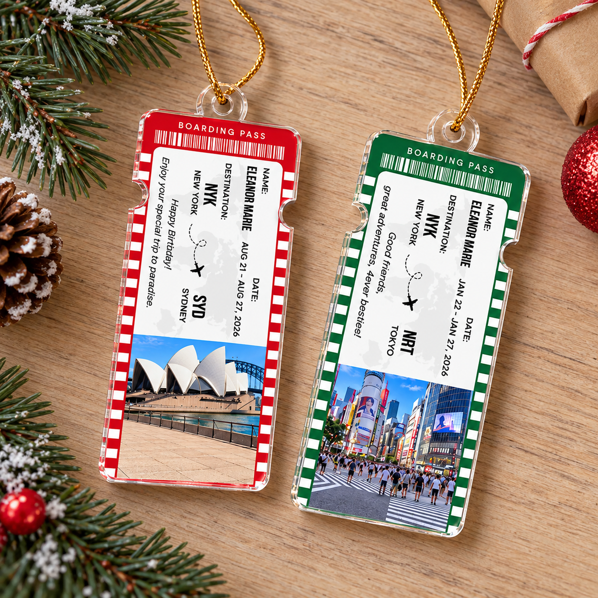 Two custom acrylic boarding pass ornaments in red and green with travel dates and Sydney and Tokyo photos.