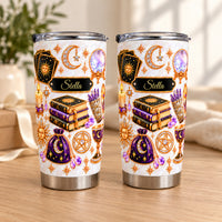 Two personalized celestial witch tumblers standing side by side on a table.