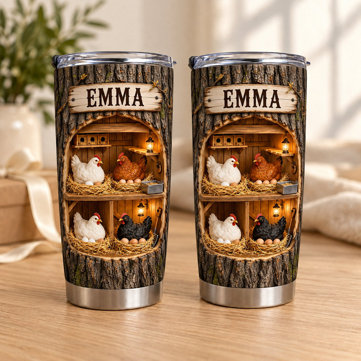 Two insulated tumblers with tree bark texture and a 3D graphic of a chicken coop interior with nesting hens, eggs, and the