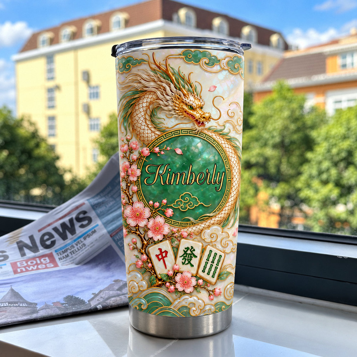 Chinese Dragon Mahjong Jade Tumbler standing near a window with a newspaper and outdoor background.