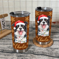 Two personalized stainless steel tumblers with a black and white Border Collie wearing a Santa hat and Christmas lights on