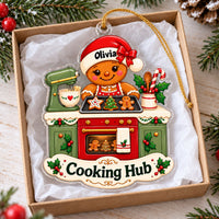 Personalized Gingerbread Kitchen Christmas Gift ornament resting inside a gift box.