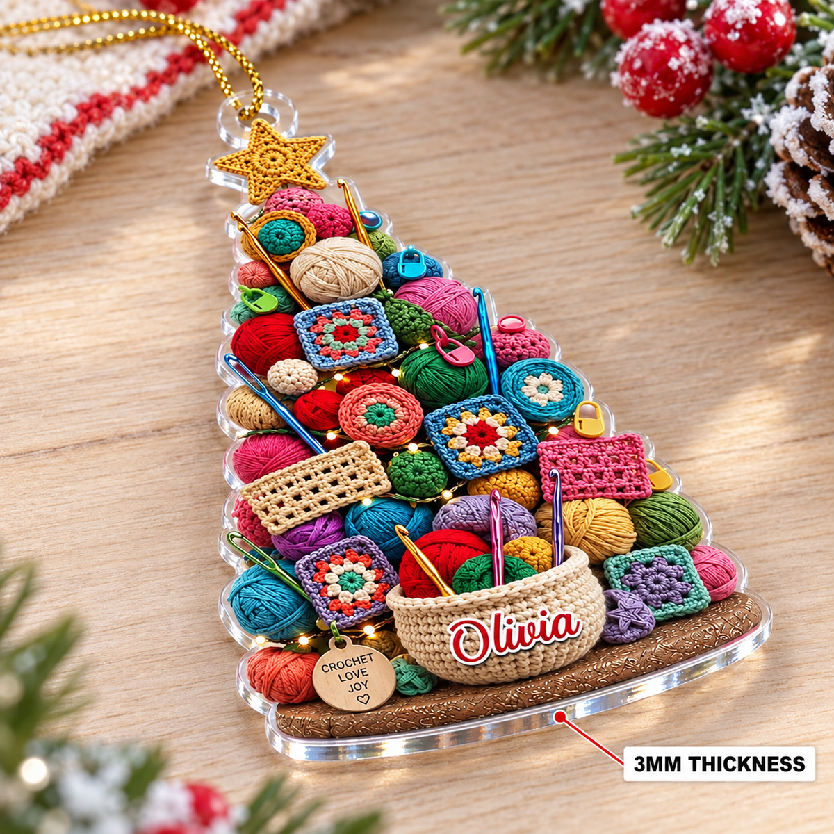 Personalized acrylic Christmas tree ornament showing a 3mm thickness and flat transparent design on a wooden surface.