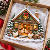 Personalized chicken coop ornament nestled inside a gift box with tissue paper and ribbon