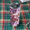 Customer in Austin, Texas wearing Cute Highland Cow Leopard Print Tumbler Personalized Boho Cowgirl Gift for Women