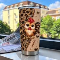 A personalized chicken cup with a cute rooster and leopard print standing on a windowsill with a newspaper in view.