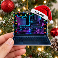 Hand holding the cyberpunk holiday decor ornament against a lit Christmas tree background.