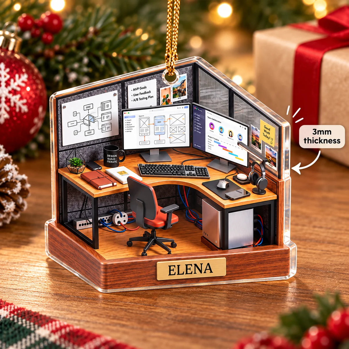 Design Build Iterate ornament resting on a wooden surface with a 3mm thickness callout badge and Christmas tree background.