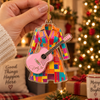 Dolly Parton Coat of Many Colors Acrylic Christmas Ornament on a hanger, ready to ship from Austin, Texas