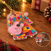 Close-up of Dolly Parton Coat of Many Colors Acrylic Christmas Ornament for streetwear fans in Austin, Texas