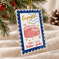 Engraved engagement acrylic postage stamp ornament with Rome landmark.