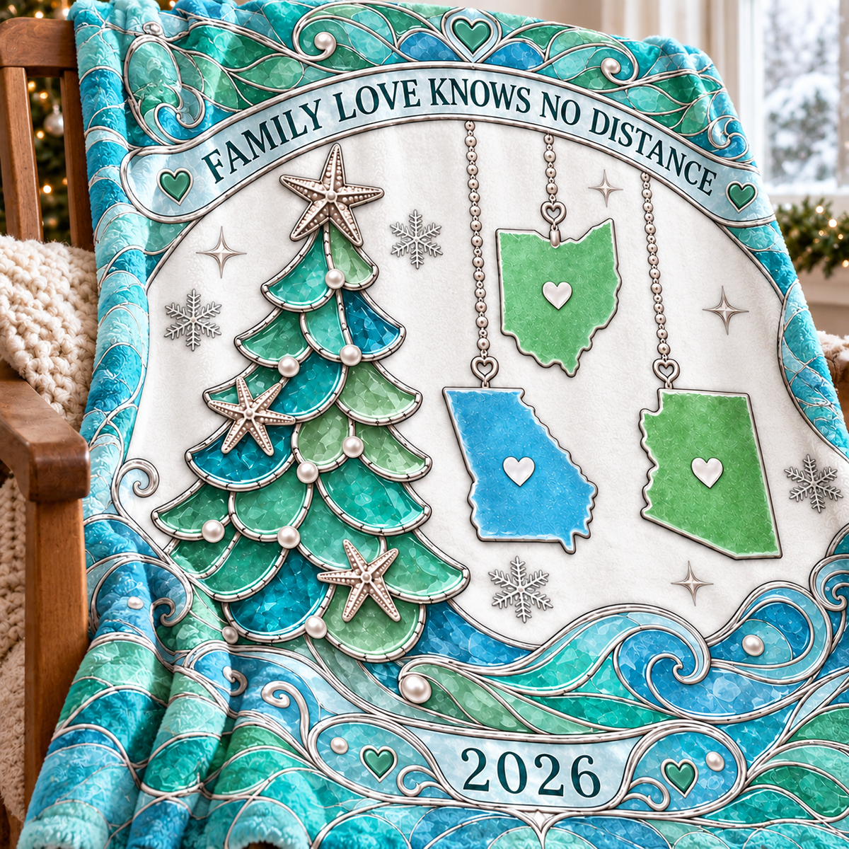 Close-up of the custom family keepsake blanket folded over a wooden chair, highlighting the vibrant teal and green design.