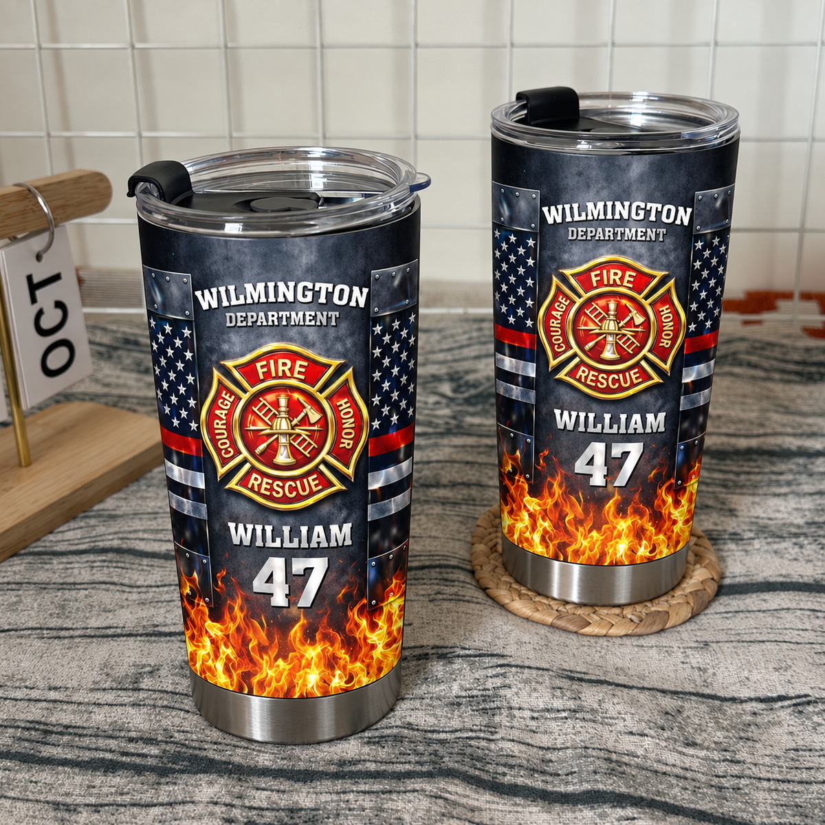 Two personalized stainless steel travel tumblers with Wilmington fire department design, American flag accents, and flames.