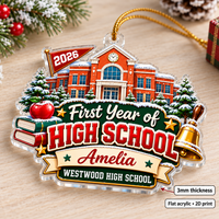 First Year of High School ornament on wooden surface with pine and gift box.