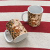 Close-up of Glitter Leopard Print Highland Cow Mug Cute Animal Lover Gift Ceramic Coffee Cup for streetwear fans in Austin, Texas