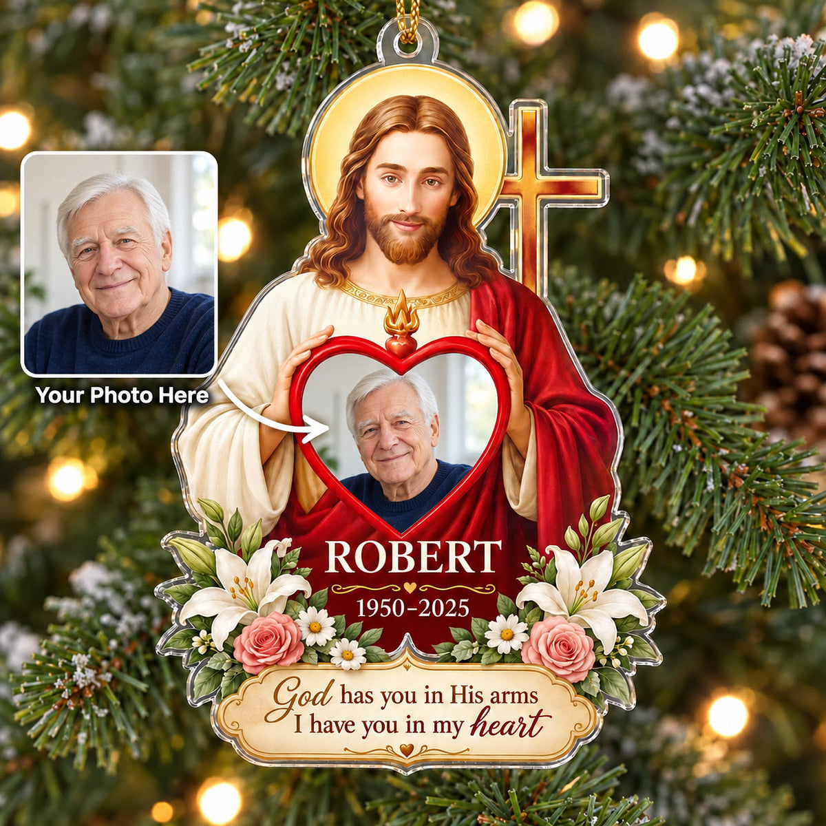 Christian memorial ornament hanging on a pine tree branch with a photo inset of an older man.