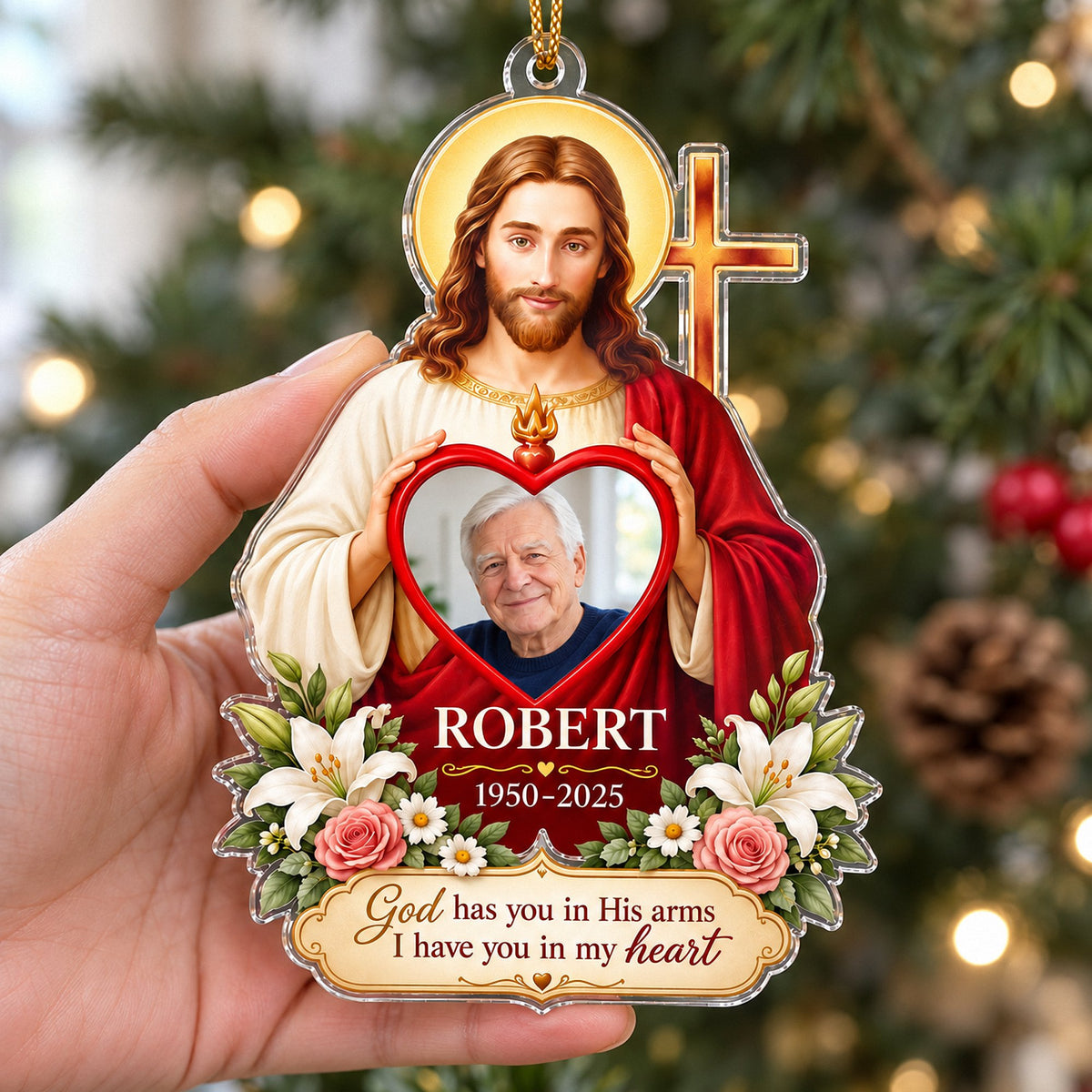 Personalized clear acrylic memorial ornament featuring Jesus holding a heart frame with a photo, white lilies, and text.