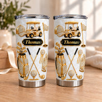 Two personalized golf tumblers with gold rhinestone graphics, a black nameplate reading Thomas, and a golf cart design on a