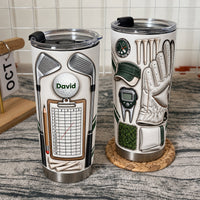 Two custom golf scorecard tumblers showing front and back artwork details on a patterned tabletop.