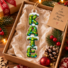 Customer in Austin, Texas wearing GRACE Ornament Christian Christmas Tree Decor Pine Branch Lights Acrylic Hanging Gift