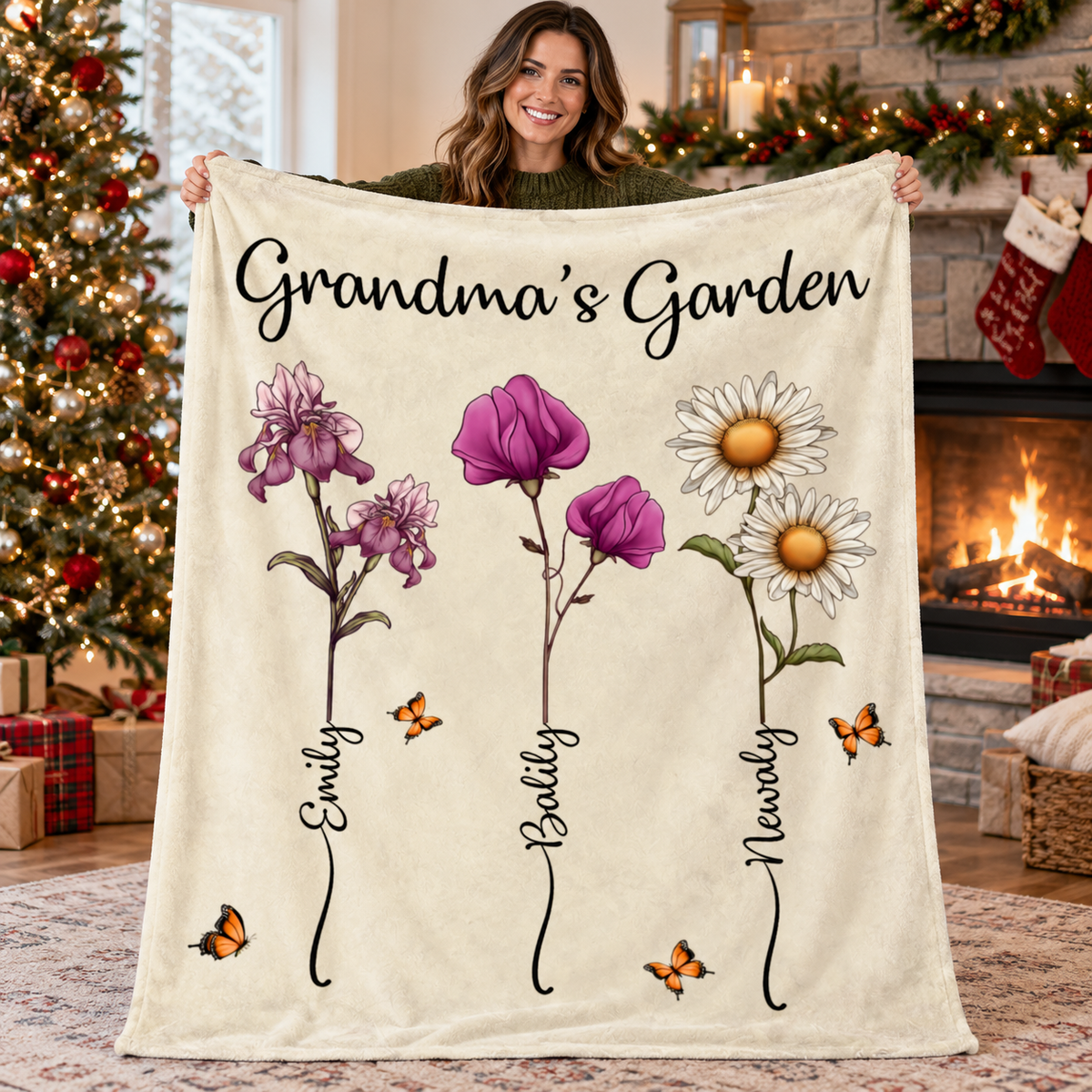A woman holds up a personalized Grandma's Garden Blanket with watercolor florals by a Christmas tree.