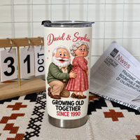 White stainless steel travel tumbler with a cartoon elderly couple and David & Sophia text standing on a patterned mat next