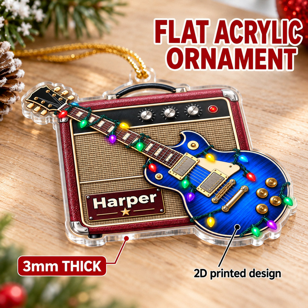 A flat blue guitar amp acrylic ornament resting on a wooden surface with a label indicating thickness and print style.