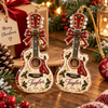 Customer in Austin, Texas wearing Guitar Shaped Personalized Christmas Ornament Custom Name Music Lover Holiday Keepsake Gift