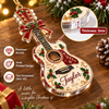 Customer in Austin, Texas wearing Guitar Shaped Personalized Christmas Ornament Custom Name Music Lover Holiday Keepsake Gift
