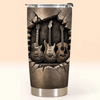 Customer in Austin, Texas wearing Guitars In Stone Wall Tumbler Personalized Stainless Steel Travel Mug Gift for Guitarist Musician