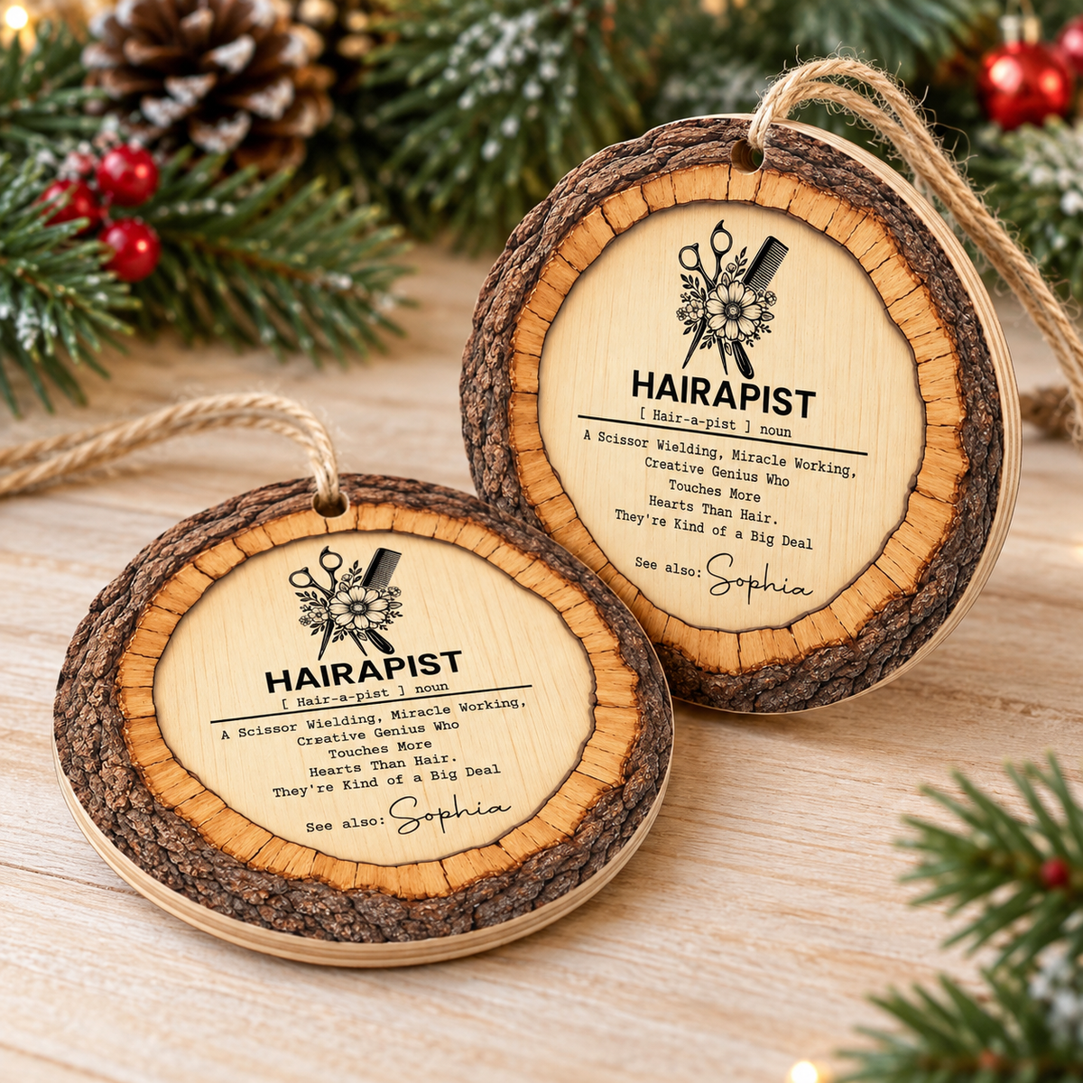 Two hairdresser Christmas gift ornaments displayed on a rustic wood surface with pine.