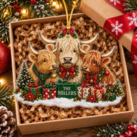 Highland Cow Family Christmas Ornament packed neatly inside a rustic gift box filled with brown crinkle paper.