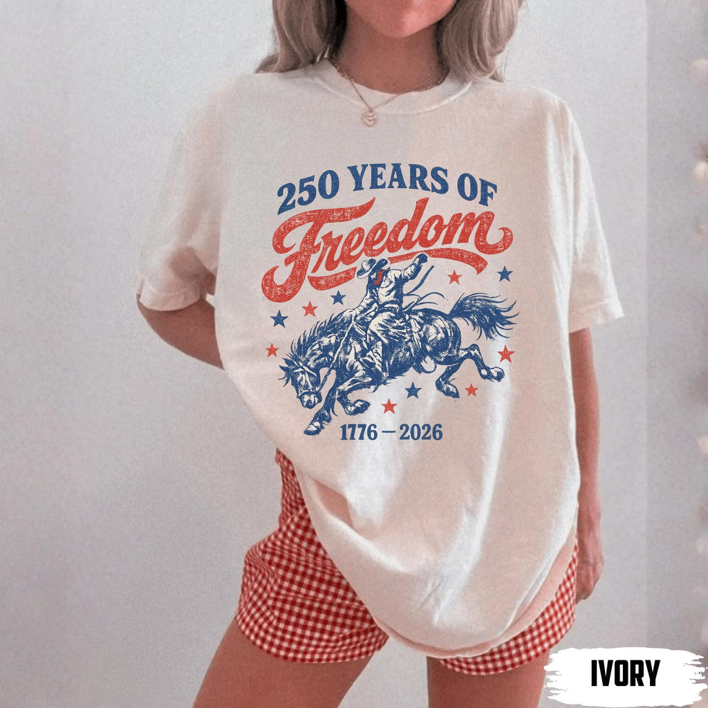 BojjiCo 250 Years Of Freedom Cowboy Graphic Boxy Tee For Women Retro Western Cowgirl Aesthetic Ivory Cotton T-Shirt 1776-2026 4th Of July Patriotic Shirt Summer Festival Top Independence Day Country Music Gift