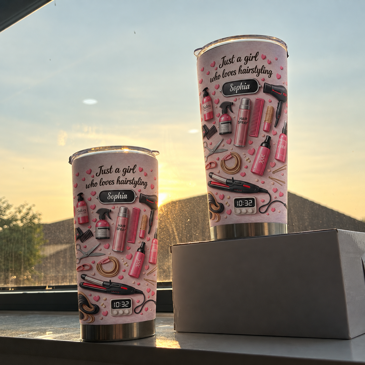 Two custom insulated travel tumblers for a hair stylist set against a sunny window backdrop.