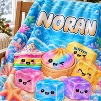 Personalized under the sea blanket with cute food characters and the name Noran on a wooden chair.