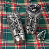 Two personalized lineman tumbler utility worker items resting on a red and green plaid holiday blanket.