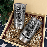 Two personalized lineman tumbler utility worker cups nestled inside a gift box filled with paper shred.