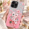 Close-up of Mahjong Cherry Blossom Phone Case Personalized Clear Cover with Pink Glitter Tiles and Sakura Design for streetwear fans in Austin, Texas